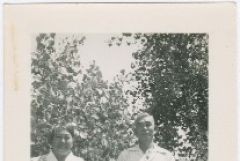 (Photograph) - Image of man and woman standing in front of trees (PDF) (ddr-densho-332-20-mezzanine-e6b568c52d)