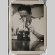Man with microscope (ddr-densho-587-64)