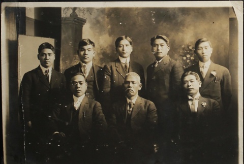 Formal portrait of eight Japanese men in Nanukaichi (ddr-densho-259-54)