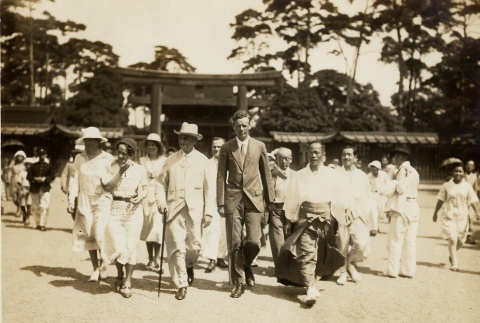 Charles and Anne Lindbergh walking with a crowd (ddr-njpa-1-1186)