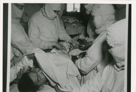 Person undergoing medical procedure (ddr-densho-1007-184)