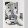 Mother and son say goodbye to a teacher (ddr-densho-37-2135)