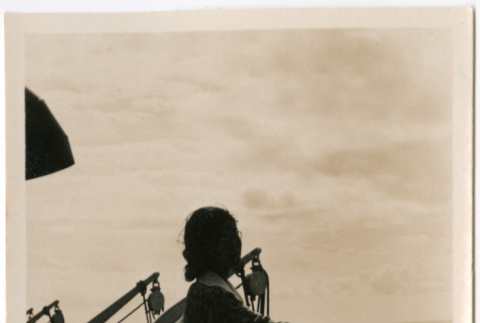 Tomoye (Nozawa) Takahashi on board ship (ddr-densho-426-1516)