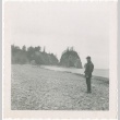 Man posing on coast (ddr-densho-326-31)