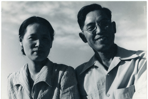 Photograph of a woman and smiling man wearing glasses (ddr-csujad-47-48)