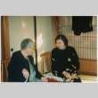 Tomoye Takahashi seated with unidentified woman (ddr-densho-422-570)