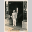 Man standing outside business (ddr-densho-426-2132)