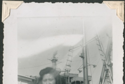 Woman standing near a ship (ddr-densho-321-175)