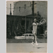 Frank Watanabe playing tennis (ddr-densho-488-10)