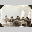 Men sitting at desks (ddr-ajah-2-427)