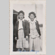 Two women standing outside barracks (ddr-densho-464-19)