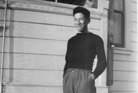 Tom Kubota in front of the family house (ddr-densho-354-86)