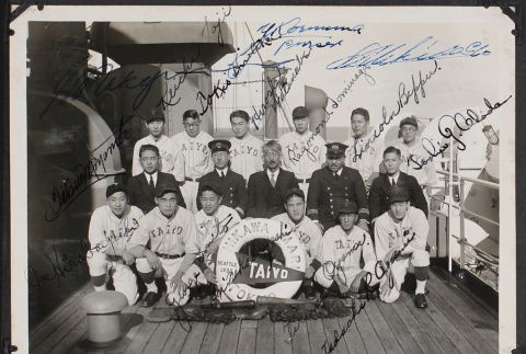 Group photo of team with ship's crew, signed by everyone (ddr-densho-326-99)