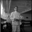 Ship steward with tray of glasses (ddr-densho-426-251)
