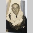 A man wearing leis (ddr-njpa-1-796)