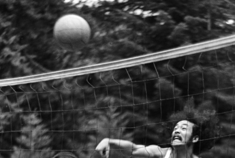Sterling Sakai playing volleyball (ddr-densho-336-562)