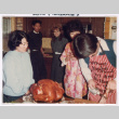 Isoshima family carving turkey (ddr-densho-477-481)