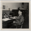 Man seated at desk (ddr-densho-426-892)