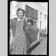 Woman standing next to car (ddr-densho-540-140)