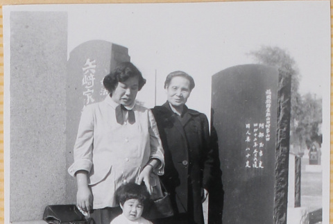 Yoshiko and Susan Shiomi with unidentified woman in cemetery (ddr-densho-522-315)