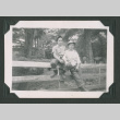 Two men on fence (ddr-densho-471-56)