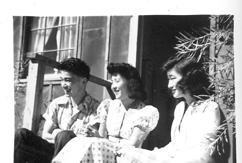 Japanese Americans on barracks porch (ddr-densho-157-27)