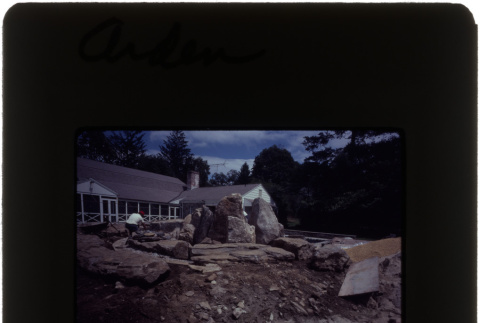 Construction on a rock garden and pool at the Arden project (ddr-densho-377-649)