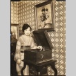 Artist posing with a record player (ddr-njpa-4-1515)