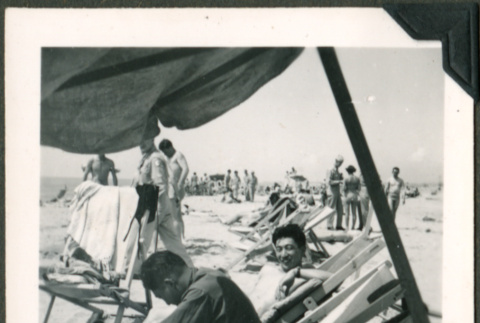 Soldiers relaxing on the beach (ddr-densho-201-638)