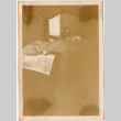Woman reflected in mirror (ddr-densho-423-556)
