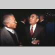 Two men talking (ddr-densho-1007-752)