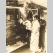 Japanese political leader being helped out of a car (ddr-njpa-4-2167)