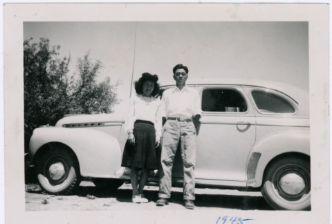 Couple with car (ddr-densho-363-56)