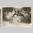 Man drinking from two cups (ddr-densho-466-273)