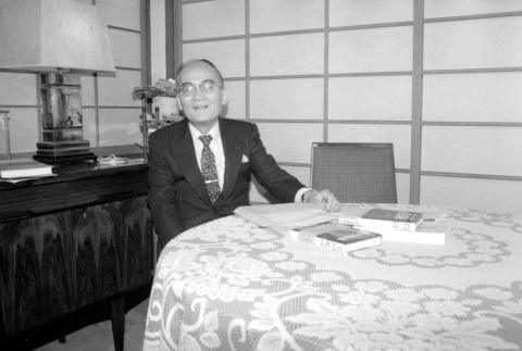 Kiyofumi Kojima at table (ddr-densho-1007-576)