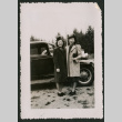 Two women in front of car (ddr-densho-359-204)