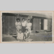 Group of women in front of the adult education barracks (ddr-manz-10-19)