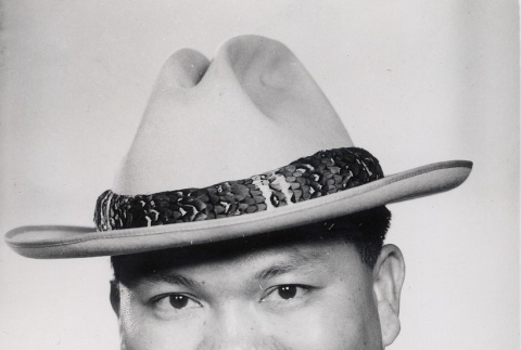Portrait of Frank W. C. Loo wearing a hat (ddr-njpa-2-622)