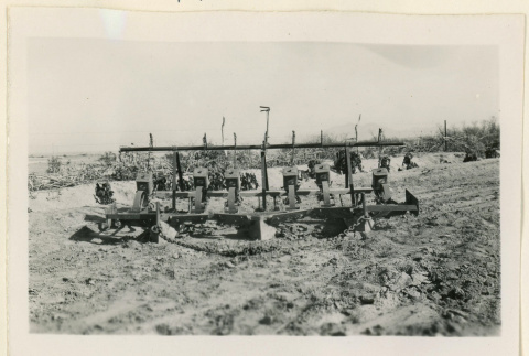 Front view of a seed planter (ddr-densho-37-1317)