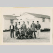 Inductees in front of Honor Roll sign (ddr-densho-37-1879)