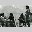 [Individuals acting out a scene at Manzanar incarceration camp] (ddr-csujad-29-118)