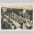 Men with leis swearing in at Hilo Armory (ddr-densho-1007-327)