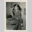 Suzanne makes a phone call (ddr-densho-37-992)