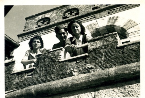 Soldier and two women on a balcony (ddr-densho-22-244)