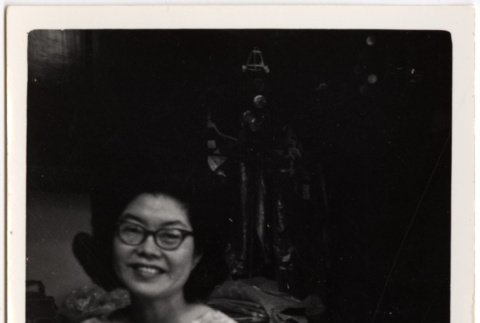 Tomoye Takahashi seated at desk (ddr-densho-426-106)