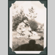 Blurry photo of a woman holding a child (ddr-densho-483-946)