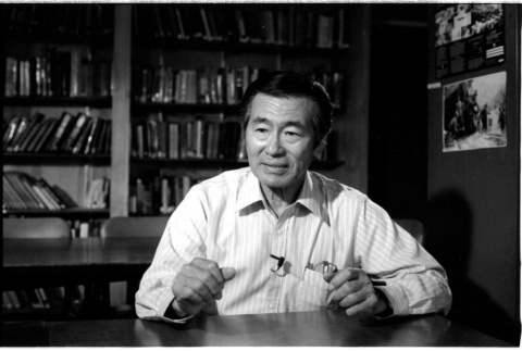 Frank S. Emi at desk (ddr-densho-1007-1157)