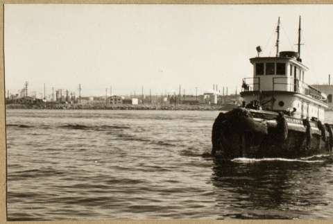 Small boat in the water (ddr-densho-542-786)