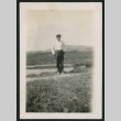 Man posing outside (ddr-densho-378-406)