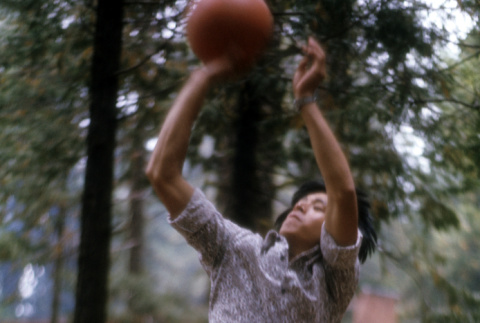 Royce Yen shooting the basketball (ddr-densho-336-833)